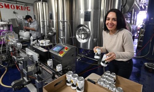 Her grandpa brewed beer in his cellar in Iran. Last month she canned 30,000 brews that taste like home